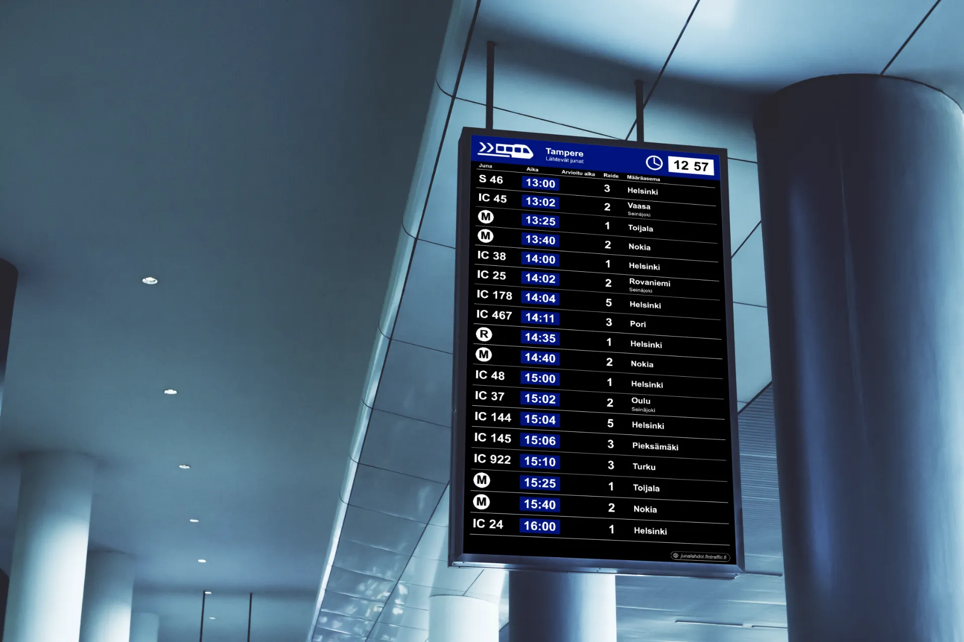 Digital signage in a public space showing transit departures