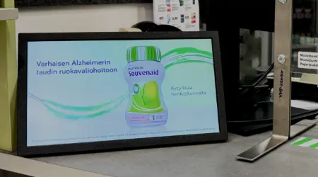 Health campaign screen in a pharmacy